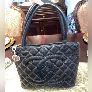 - Chanel Black Medallion Tote